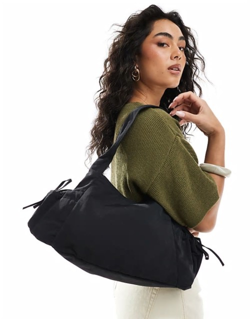 slouchy tote bag with tie pockets in black
